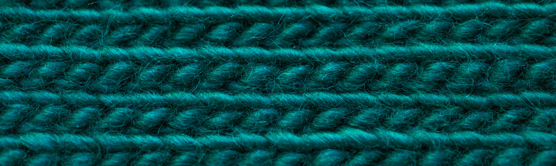 Woolen fabric, front surface, from yarn for knitting green, background. .Emerald background