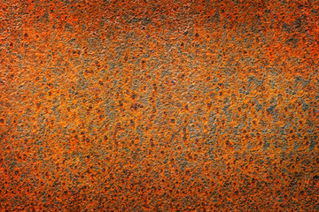 Old rusty iron sheet background. The rust structure is orange-brown. Grunge tone pattern.