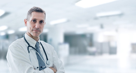 Doctor standing in confident pose, he waiting for help his patient in his office