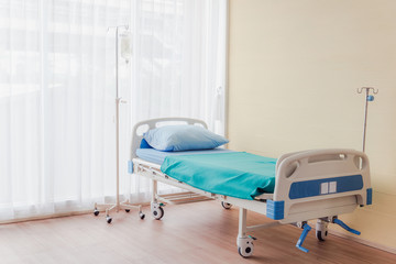 Nursing care bed in hospital room