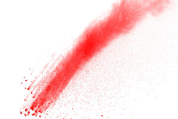 Red powder explosion on white background. Colored cloud. Colorful dust explode