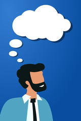 Thoughtful bearded business man with a speech bubble on a blue background. Man is looking for inspiration