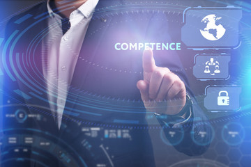 Business, Technology, Internet and network concept. Young businessman working on a virtual screen of the future and sees the inscription: Competence