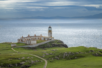 Fototapeta na wymiar The summer view of Neist Point Lighthouse on Isle of Skye in Scotland