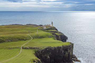 The summer view of Neist Point Lighthouse on Isle of Skye in Scotland