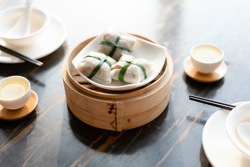 dim sum in bamboo steamer chinese cuisine