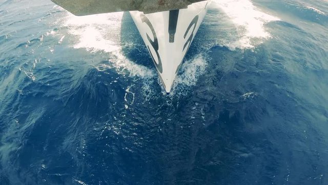 Front view of a sailing vehicle crossing the waters. Yacht sailing at sea.