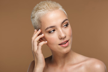 Blonde stylish woman with short haircut