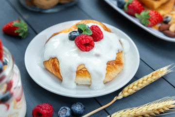 Yogurt and bread with berry on top