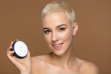 Smiling young blonde stylish woman with short haircut