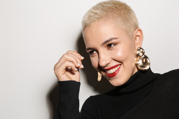 Cheerful blonde stylish woman with short haircut