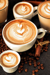 Latte art drawn on various espressos