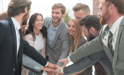 close up. a group of corporate employees showing their unity