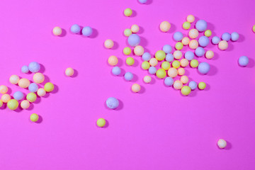 Foam balls on a pink background for design and Valentine's Day