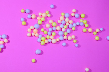 Foam balls on a pastel pink background for design and Valentine's Day
