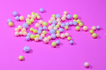 Foam balls on a pink background for design and Valentine's Day