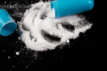 White medical pills and tablets with bottle