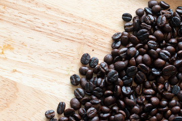 Coffee been on  wooden background.