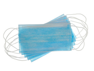 Disposable protective face masks on white background. Influenza or similar viruses protection...