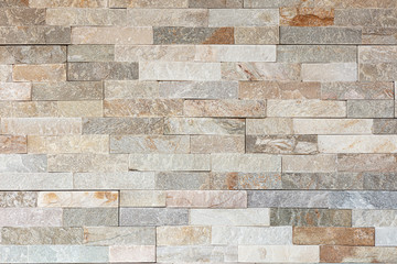 Stone wall pattern, decorative background texture. Light brown brick wall background for interior or exterior brick wall building and brick decoration texture.