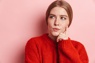 Photo of serious beautiful woman posing and looking aside