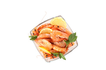 Square bowl with shrimps, parsley and lemon isolated on white background
