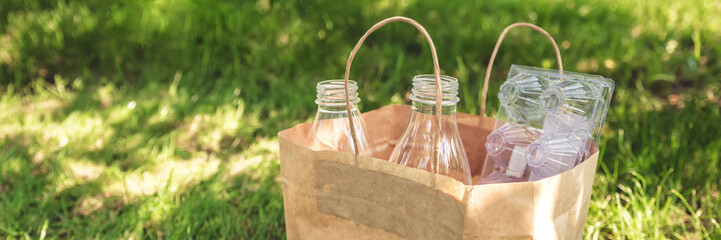 Zero waste package with plastic bottles in nature