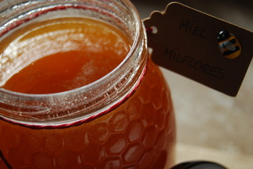 Natural Honey in Jar with Tag with Spanish words 