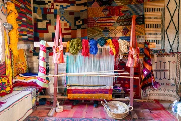 Fototapeten Traditional weaving machine used to produce famous Berber carpets, Morocco © malajscy