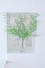green plant in a glass vase