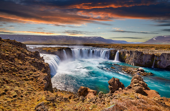 Panorama of most famous place of Golden Ring Of Iceland. Godafoss waterfall near Akureyri in the Icelandic highlands, Europe. Popular tourist attraction. Travelling concept background. Postcard.. © zicksvift