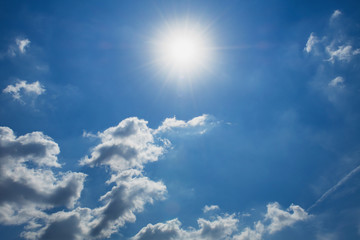 Naklejka na ściany i meble beuatiful blue sky with white cloud and sunshine background