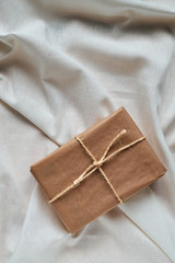 Gift package wrapped in jute paper