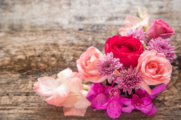 Bouquet of pink roses on a wooden background. zero waste gift on Mother's Day. Women's day card. 8 march happy womens day
