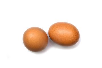 Two fresh organic chicken eggs isolated on white background