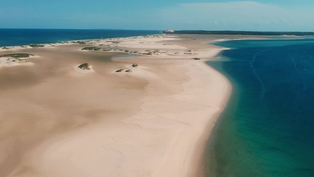 Vivid Sandy Isthmus and Blue Seas