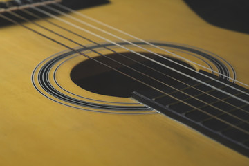Obraz premium Guitar close up. acoustic musical instrument. strings on the guitar neck