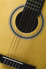 Guitar close up. acoustic musical instrument. strings on the guitar neck