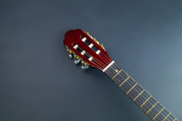 Guitar neck close up. guitar headstock with tuning pegs. musical instrument. copy space