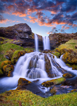 Sheep's Waterfall. Famous tourist landscape. Travel concept background. Dramatic summer sunrise, Iceland, Atlantic Ocean, Europe. Travel postcard. © zicksvift