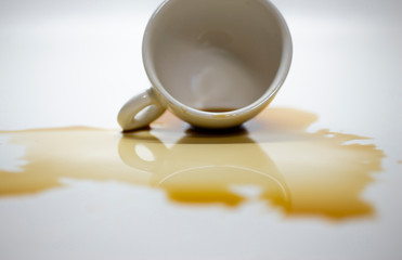 Coffee water spilled on a white background.