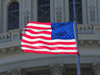 US capitol American flag half-mast.