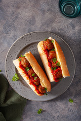 meatball sub sandwich with cheese and marinara tomato sauce. american italian fast food