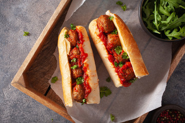 meatball sub sandwich with cheese and marinara tomato sauce. american italian fast food