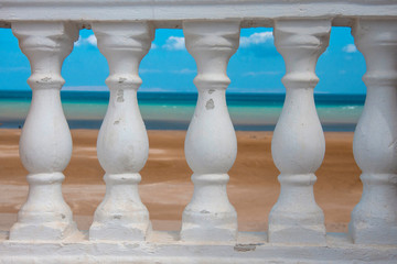 white balusters on a close-up, concrete
