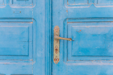 Vintage blue door, wooden door with golden handle