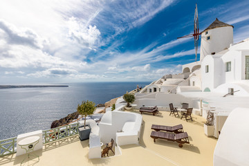 Amazing travel landscape, postcard style view. Oia Santorini in summer. White buildings of santorini. Mill Houses Santorini