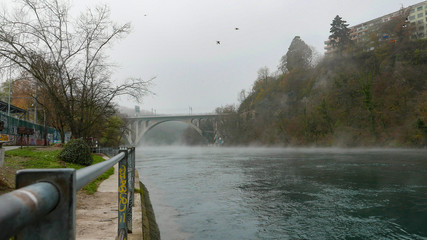 River in a foggy  grey day