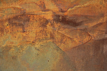 Еexture of rusty iron, cracked paint on an old metallic surface, sheet of rusty metal with cracked and flaky paint, abstract rusty metal texture. Horizontal