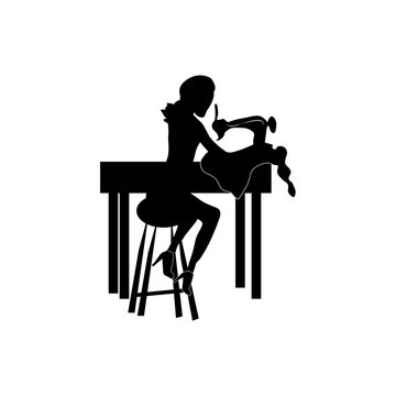 recommend clip art: woman working at a sewing machine black silhouette